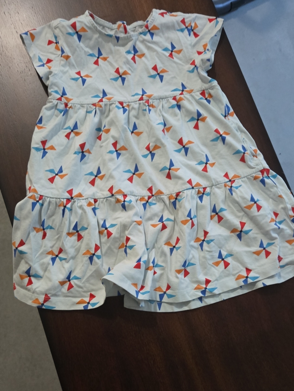 Primary White Dress with Red, Blue, and Orange Pinwheel Print